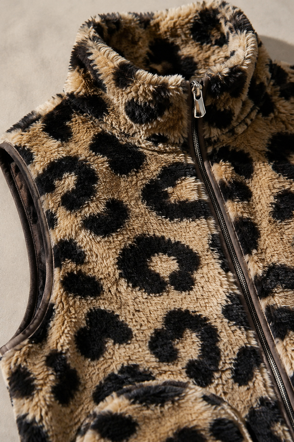 Delvine Dark Brown teddy fleece and zipper macro detail