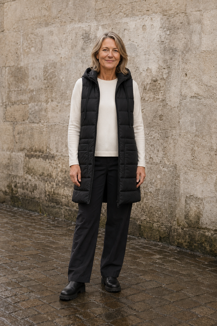 Elena black long puffer vest open matched background