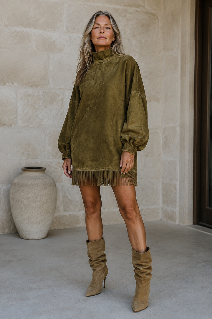 Full-length editorial image of Faux Suede Turtleneck Fringe Dress