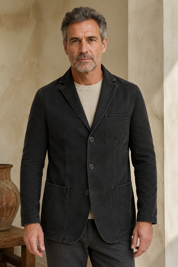 Black washed cotton blazer color hero, direct camera gaze