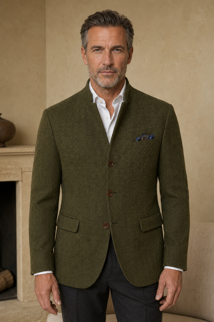 Olive green herringbone tweed blazer color hero, direct camera gaze