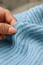 Darlene | Long Sleeve V-Neck Button Top fabric texture close-up