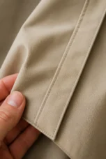 Anastasie | Longline Waterproof Coat - fabric close-up