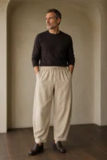 Beige relaxed wide leg trousers waist to hem