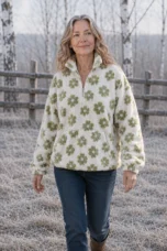 Dahlia Floral Sherpa Fleece Half Zip in green, outdoor editorial view