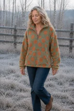 Dahlia Floral Sherpa Fleece Half Zip in orange, outdoor editorial view