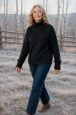 Edwidge Straight Cut High Neck Pullover in black, outdoor editorial view