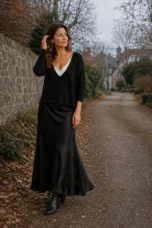 Elisabeth black knit top and satin skirt set on an autumn lane