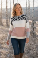 Meredith Muted Leopard Knit Sweater in pink, natural walking editorial view