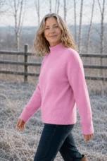 Selma Drop Shoulder Mock Neck Sweater in Pink, outdoor editorial photograph